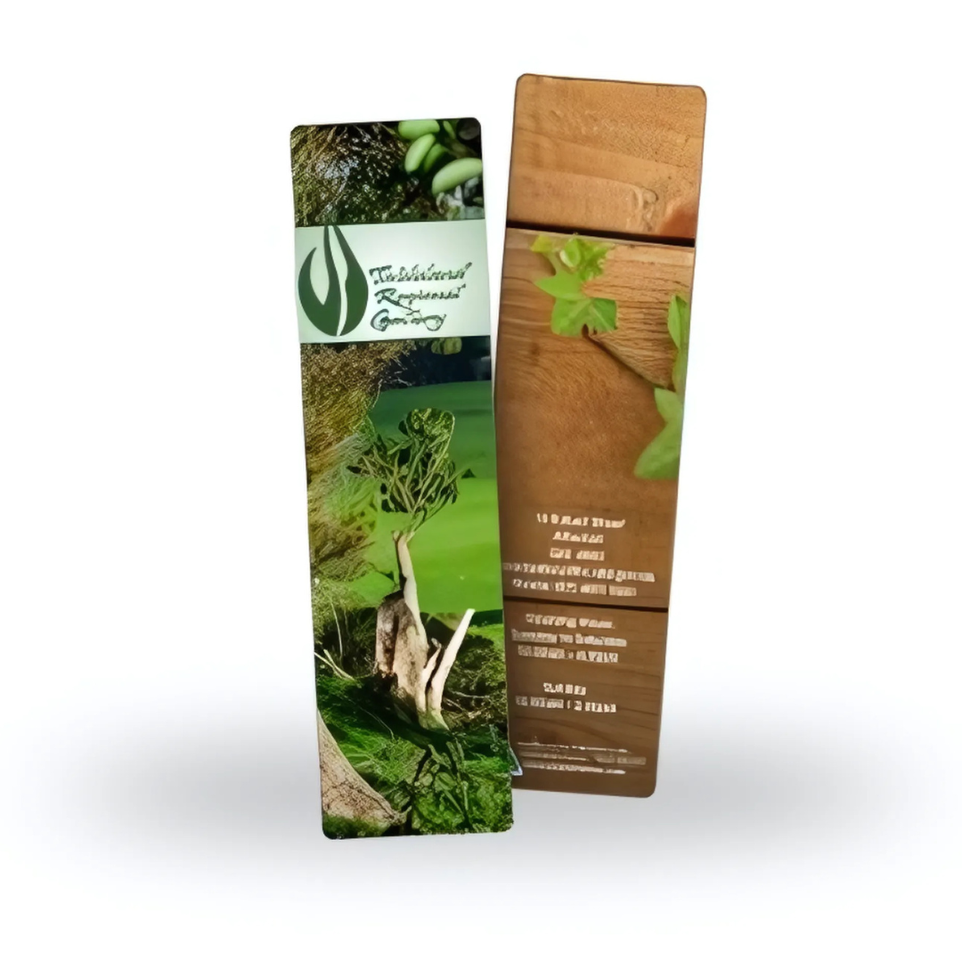 Two wooden FlipMark bookmarks: one with a green nature design featuring a tree, and the other engraved with brand and product specifications. Each bookmark boasts a unique, earthy texture.