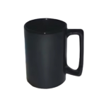 The Extra Big Customised Mug (black), with a glossy finish and sturdy handle, is elegantly isolated on a white background.