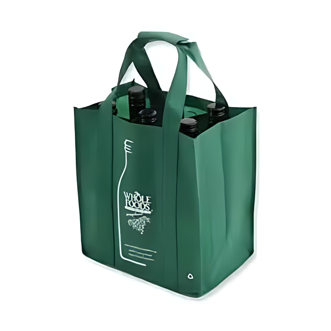 The Non Woven Bottle Bag - 6 Bottle 26x28x18cm is a reusable green grocery bag with the Whole Foods logo, designed to securely hold up to six bottles. It features sturdy handles for easy carrying.
