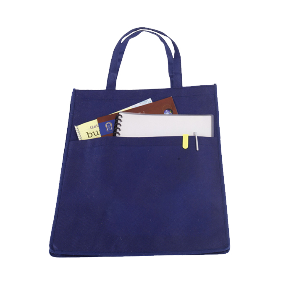 The Non Woven Conference Bag (32x40x12cm) in blue has two handles and a front pocket containing a spiral notebook, folder, brown book, small yellow card, with a pen clipped to the folder.