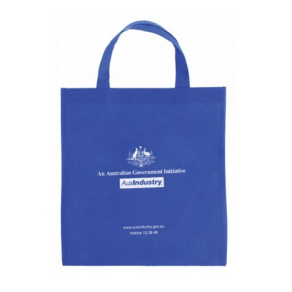 Small Non Woven Tote Bag - 29x34 cm, in blue. Displays the Australian Government crest, An Australian Government Initiative and AusIndustry in white. Includes a website URL and hotline number.