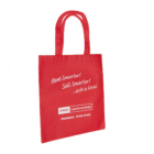 The Non-Woven Tote Bag - Small 29x34 is red, adorned with Rent Smarter! Sell Smarter! ...ask a local in white text, the PRD nationwide logo, and the phone number: PANANIA 9792 8188. It features two sturdy handles.