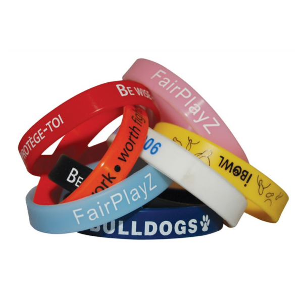 Colorful Printed Silicone Wristbands with texts like FairPlayZ and BULLDOGS.