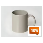 A plain white can mug with a curved handle sits against a light background. In the bottom right corner, an eye-catching orange label boldly displays new, making it the perfect promotional item for your brand. Product: Promotional Coloured Can Mugs.