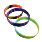 Three Sectional Coloured Debossed Silicone Wristbands with vibrant patterns and text.