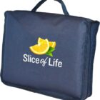 A blue fabric bag with a handle, featuring a logo of orange slices and the text Slice of Life printed on the front.
