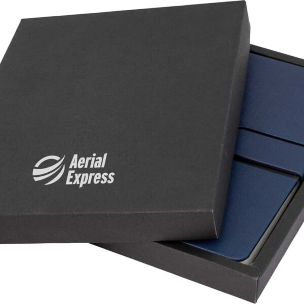 A dark gray box with the logo Aerial Express is open, revealing two navy blue items inside, possibly notebooks or devices. The box is at an angle, highlighting its sleek design.