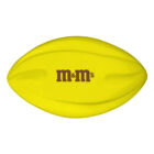 Yellow football-shaped object with M&Ms logo in brown at the center.