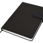 Closed black notebook with a band closure on a white background.