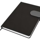 A closed black notebook with a gray strap and ribbon bookmark.
