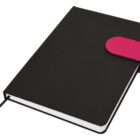 Black notebook with a pink strap and a ribbon bookmark.