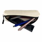 Beige pencil case with pens and rulers partially visible inside.