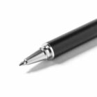 Close-up of the tip of a black ballpoint pen on a white background.