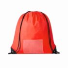 Red drawstring backpack with front pocket and black straps.