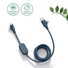 Eco-friendly USB charging cable with recycled materials and a small green plant nearby.