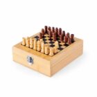 Small wooden chess set with pieces on top of a box, photographed on a white background.