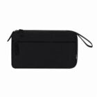 Black zippered wristlet pouch with a front pocket and a small tag on the side.