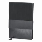 Black notebook with a textured cover and an elastic band closure.