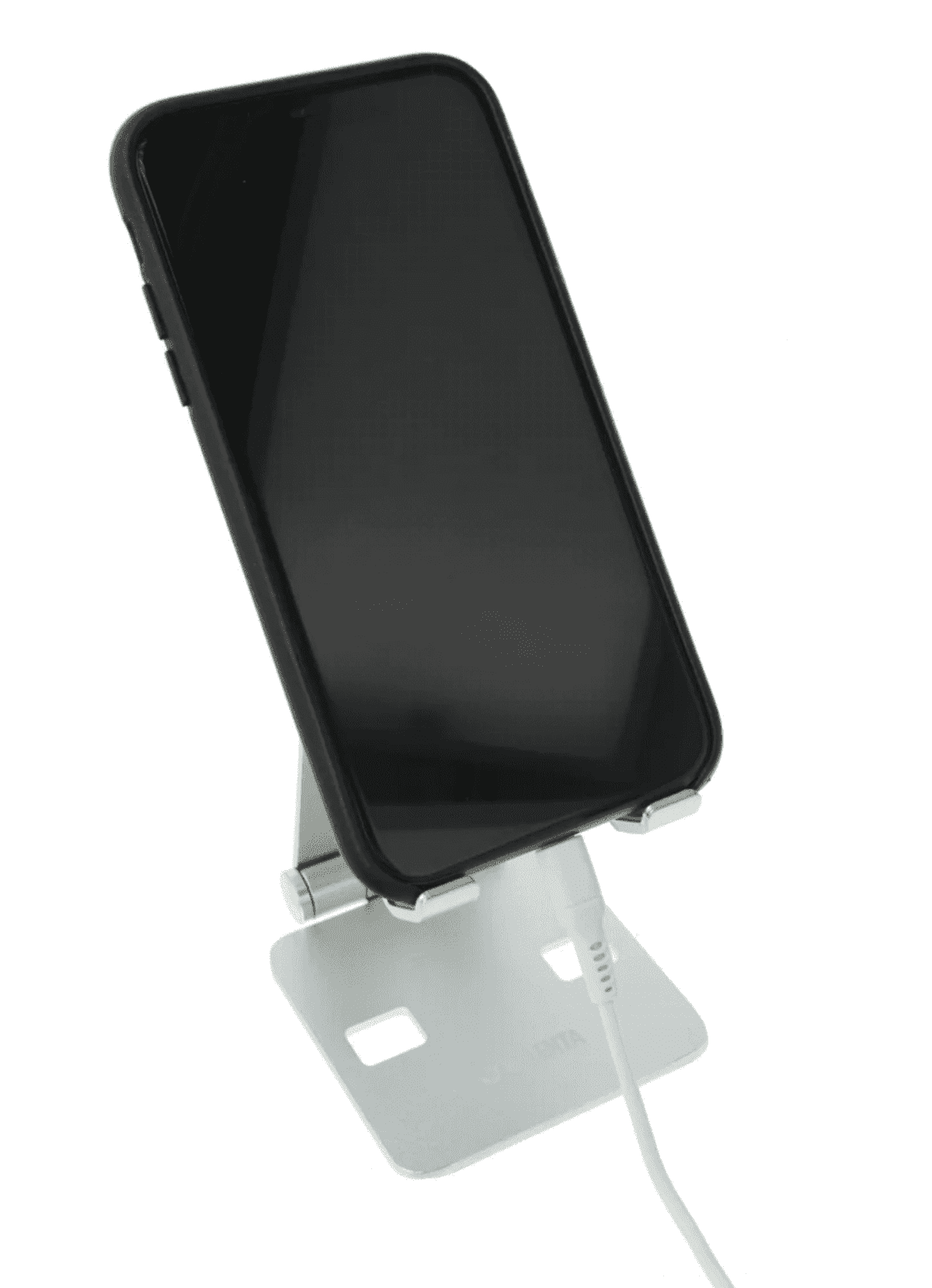 Black smartphone on a white stand with a charging cable attached.
