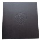 Black tile with Family Healthcare Services and family logo embossed in the center.