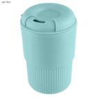 Light blue travel mug with lid and ribbed design.