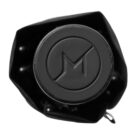 Black round object with embossed M inside a black pouch, viewed from above.