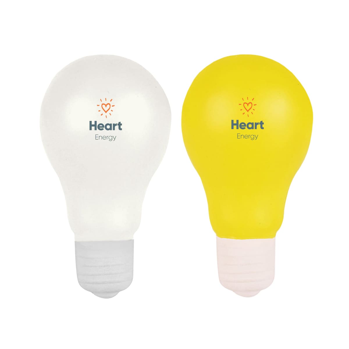 Two light bulb stress balls are displayed: one white and one yellow. Both have the Heart Energy logo featuring a heart and a small sunburst above it.