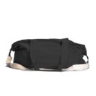 Black duffel bag with beige straps, lying flat against a white background.