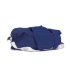 A blue duffel bag with white straps, lying flat on a white background.