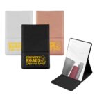 Three folding mirrors in white, rose gold, and black, with Country Roads take me home text.