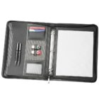 The black leather Contrast Ring Folder features a sleek design with a three-ring binder and lined paper on the right. On the left, slots neatly organize pens, business cards, and USB drives, combining style with functionality.