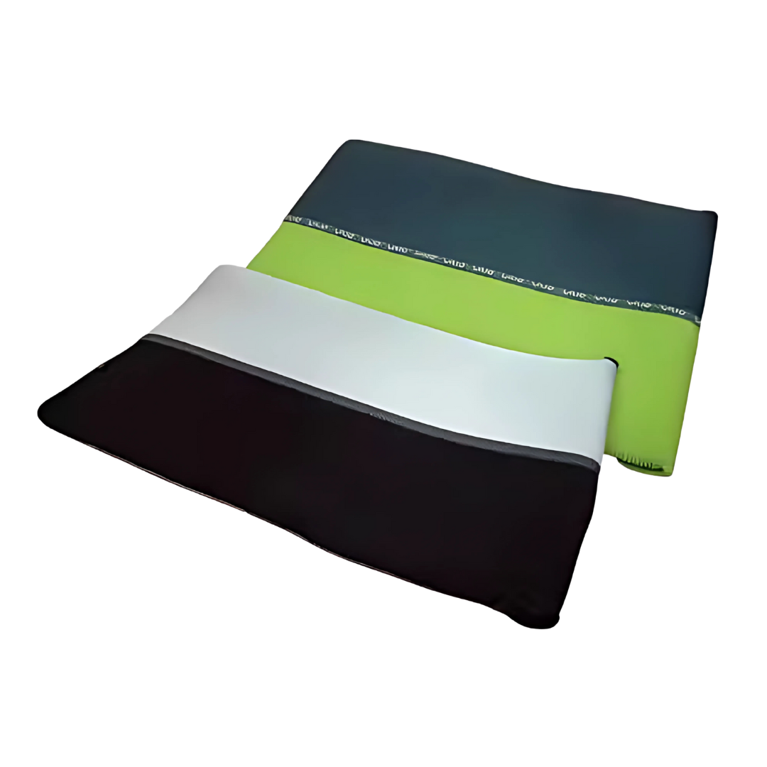 Two laptop sleeves, one black & white, the other green & gray, on a custom background.
