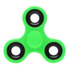 A green fidget spinner with three black bearings on a white background.