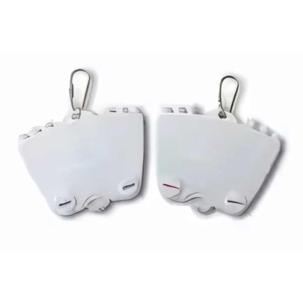 Two abstract, white earrings with top clips feature curves and cutouts inspired by a caddys fluid design, offering a modern, artistic look.