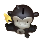 Introducing the MICKEY THE MONKEY COIN SAVINGS BANK, a charming black-and-white cartoon creation with a coin slot on top and 24/7 SUPPORT NETWORK displayed on its body. Mickey, holding a cheerful yellow banana in his left hand, promises to guard your savings with playful style.