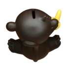 The MICKEY THE MONKEY COIN SAVINGS BANK is a black bear-shaped bank holding a yellow banana. From above, the ingenious design features a coin slot on its head.