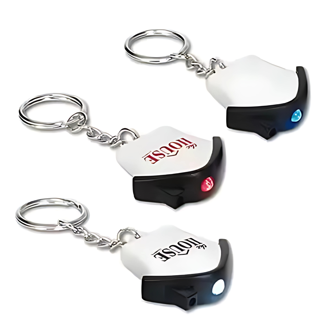 The Mini Promotional House Flashlight Keytags combine style and functionality with metal loops and red or blue lights on a white surface, featuring printed text. These keychains add a vibrant pop of color to your essentials.