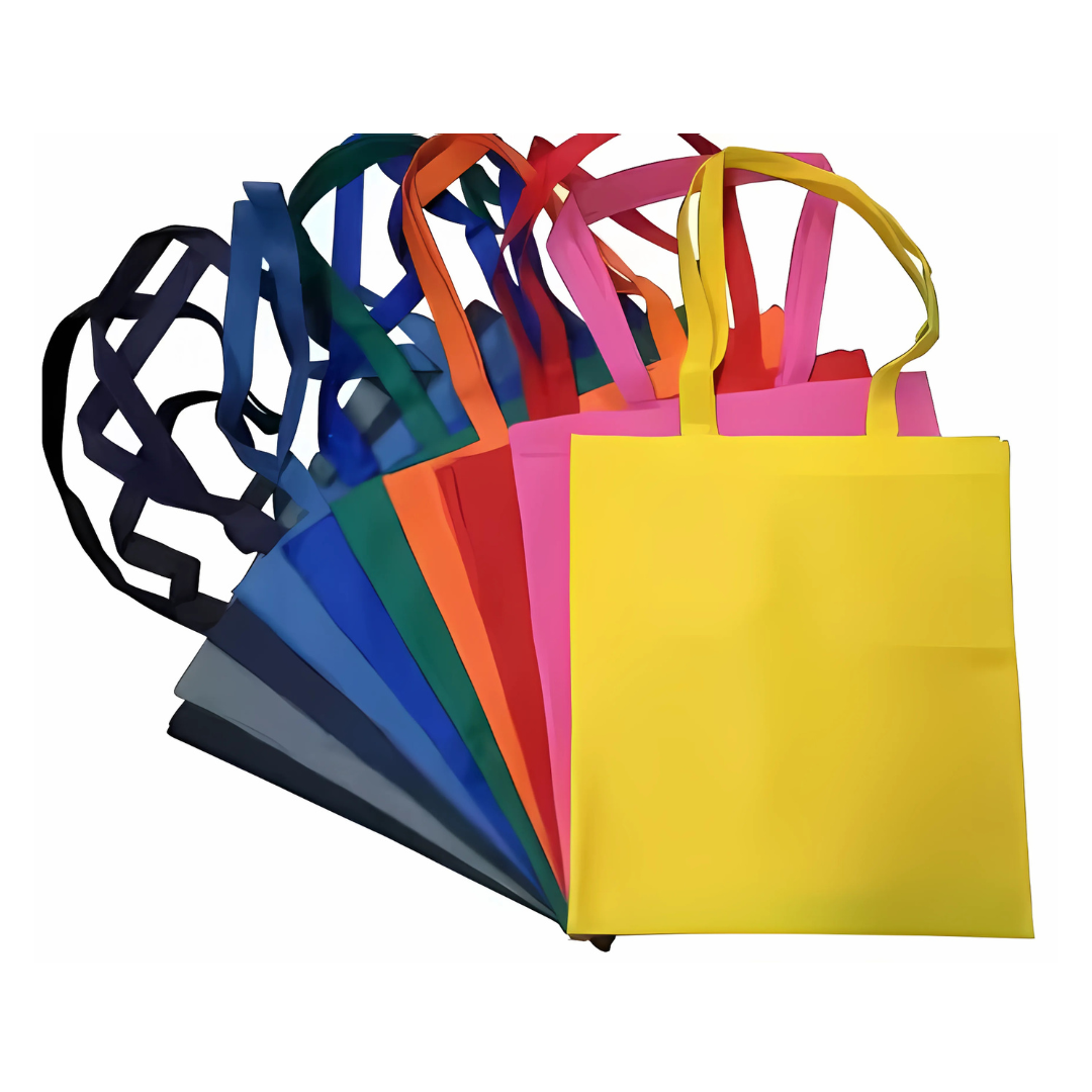 The Non-woven Tote 38x42cm wGusset Local collection displays a vibrant fan of bags in bright yellow, pink, red, orange, blue, and black with matching handles and spacious gussets for functionality.