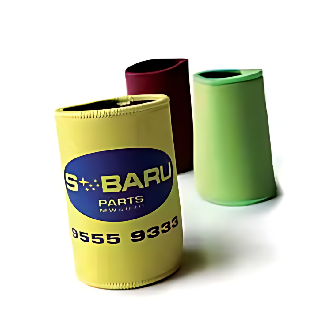 The Plastisol Stubby Cooler comes in three colors: yellow with a blue and white logo, dark red, and green. They are cylindrical, durable, made from plastisol material, and keep drinks chilled while adding vibrant color to any setting.