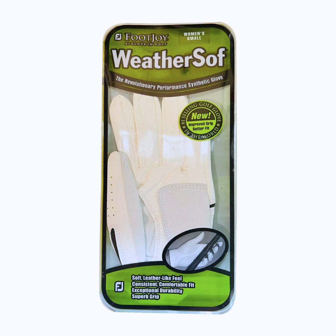 The Qmark Logo Golf Glove packaging highlights the iconic logo, emphasizing its soft, leather-like feel, exceptional durability, and superior grip. The glove is stylishly displayed through a clear section.