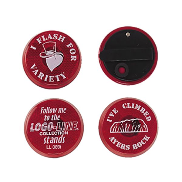 THE FLASHER BADGE