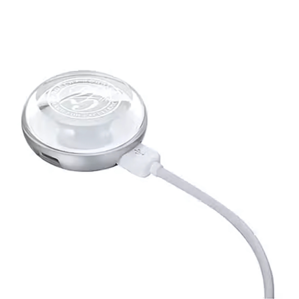 The USB HUB LIGHT is a sleek, round silver device with a transparent top featuring a logo. It connects via a USB cable on the right side and boasts a modern design that seamlessly integrates into any setup.