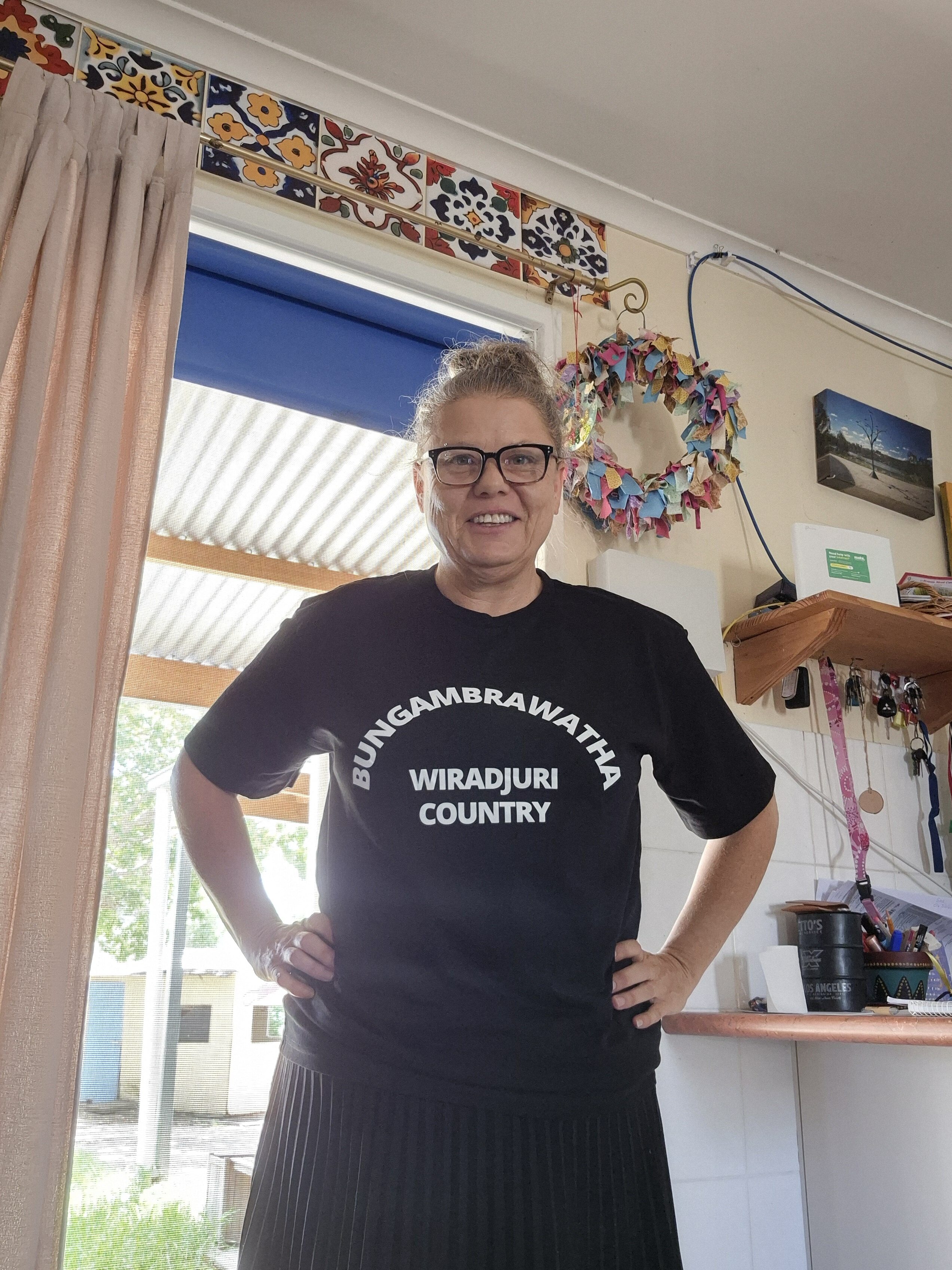 lady wearing a black printed t-shirt