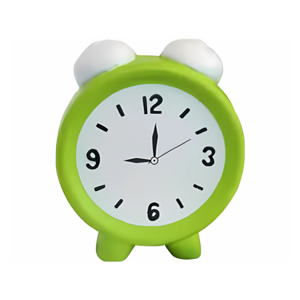 The Clock Stress Toy is a charming green frog-shaped alarm clock with two white eye-like bumps on top, displaying 10:10. Its a whimsical desk accessory and offers a playful touch of stress relief to your workspace.