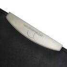 Close-up of a silver metal handle with the text recruitmentsuper engraved on it. The handle is attached to a dark surface, possibly a leather or fabric texture.