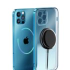 A blue smartphone with a glossy finish and three camera lenses is paired with a clear phone case. The case features a circular black magnetic attachment on its back.
