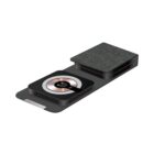 A sleek, black foldable wireless charger with a fabric-covered section and a rectangular base. The charger features a circular charging pad with a metallic accent and a symbol in the center, suitable for modern electronic devices.