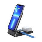 A sleek, black 3-in-1 wireless charging station with a smartphone, smartwatch, and earbuds charging. The smartphone shows a full charge, while the smartwatch and earbuds are placed on their respective charging areas.