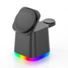 A sleek black wireless speaker with glowing multi-colored LED lights at the base, featuring a modern, angular design and a flat circular top.