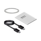 Charging cable, ring, and user manual on a white background.